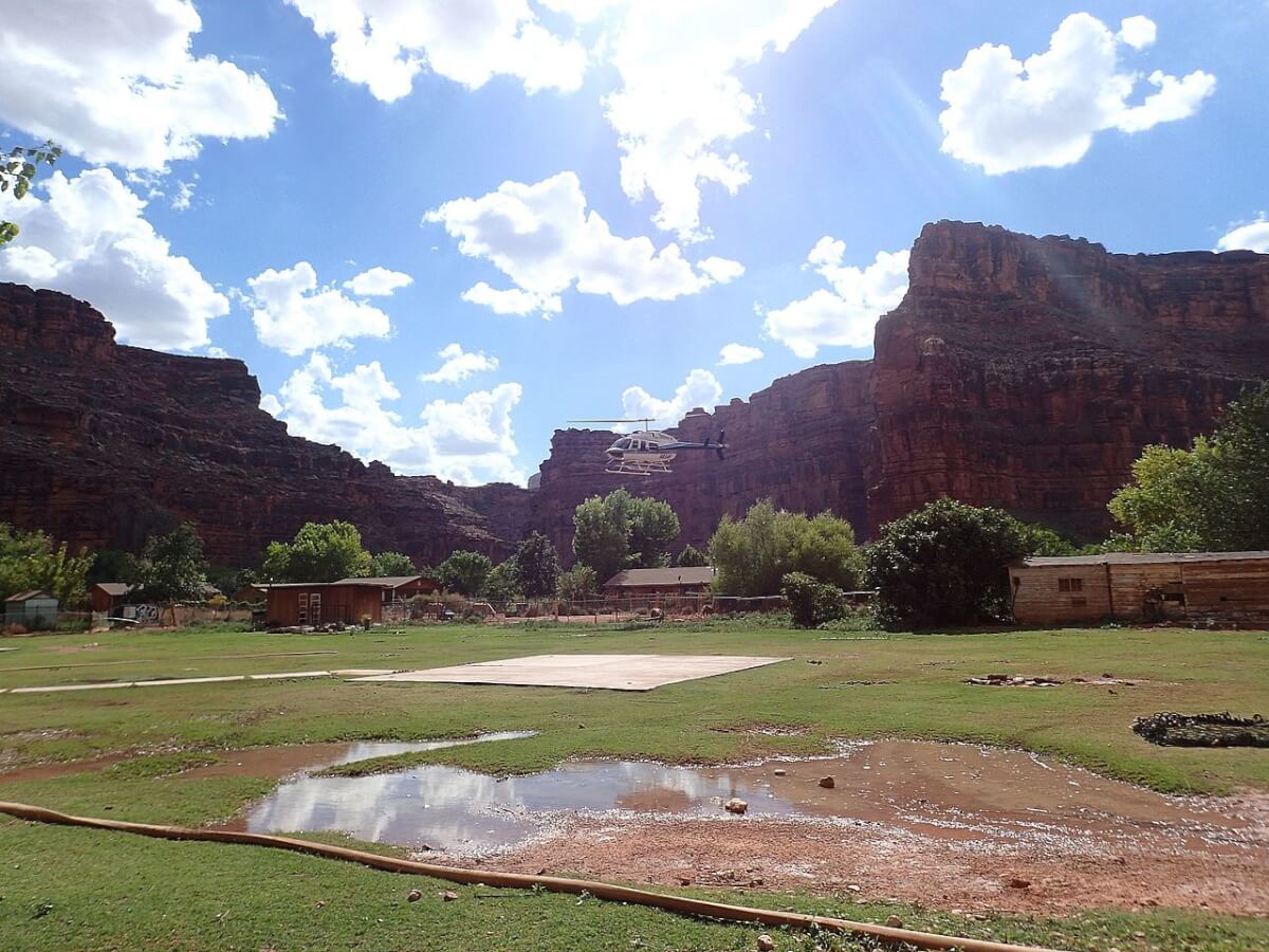 Swamped Canyon: Flash Flood Sends Arizona Tourists Scurrying for High Ground