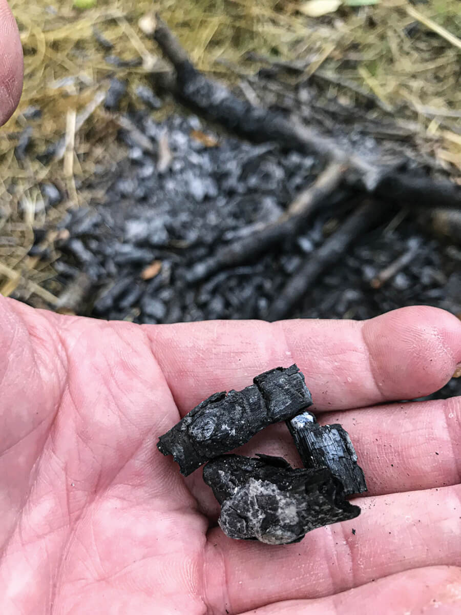 Charred wood collected from the fire can be rekindled to start the next fire. 
