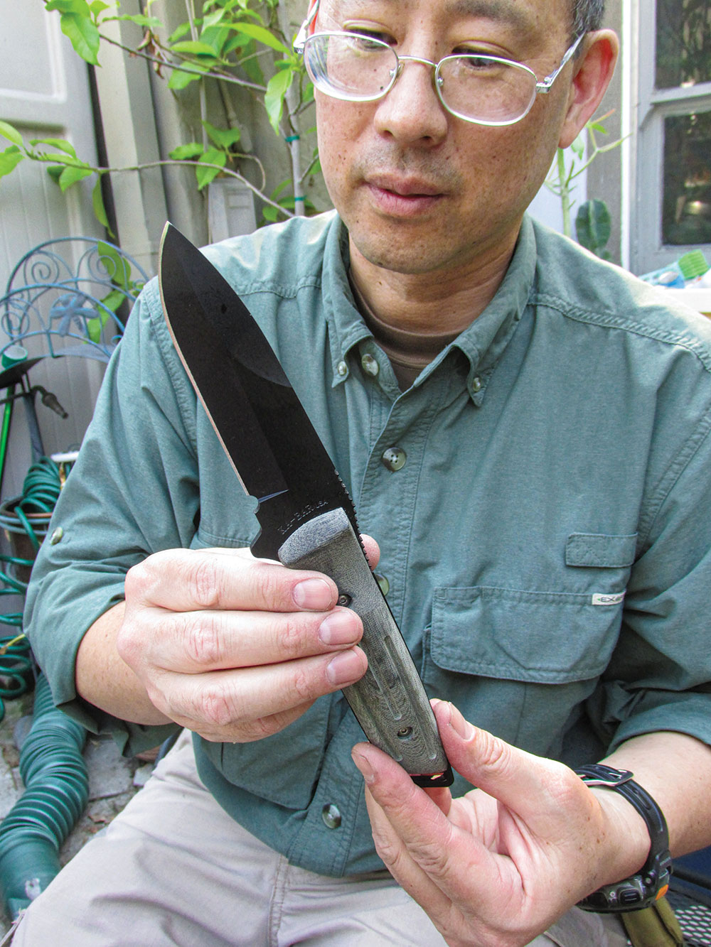 Army veteran Mark Tsunokai is partial to his full-tang KA-BAR knife.