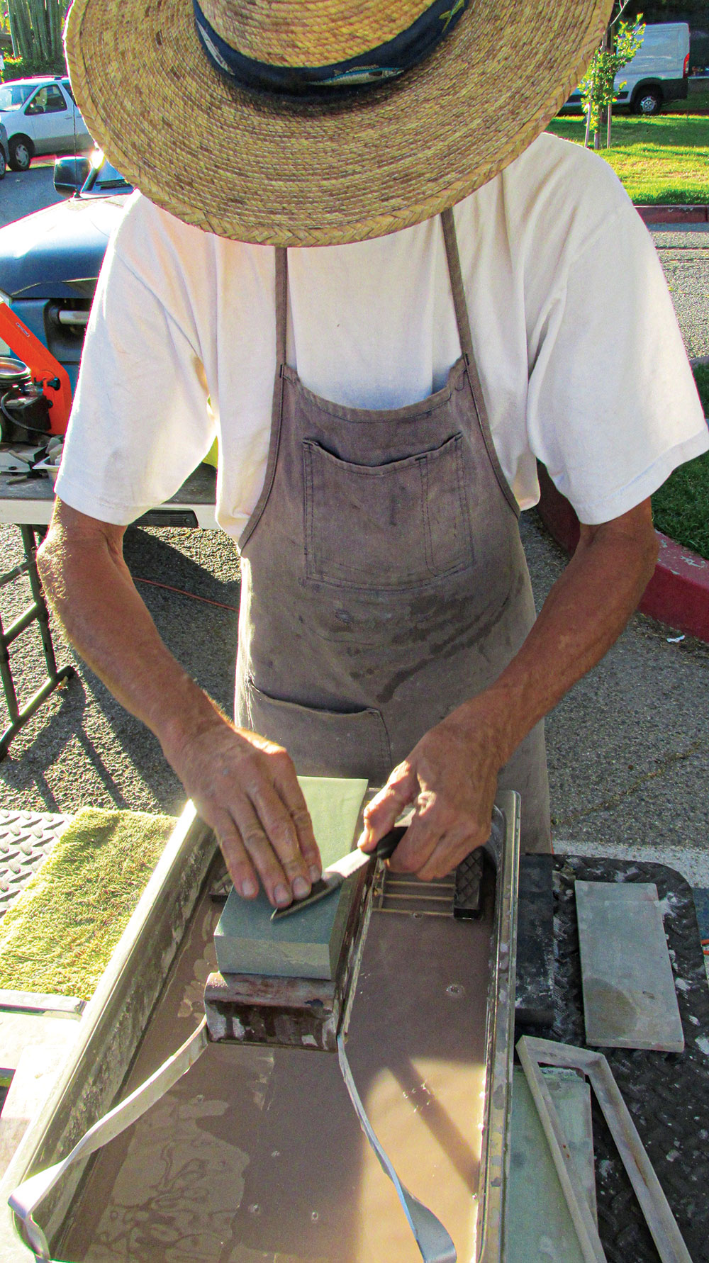 Julio Toruno demonstrates a Japanese style of knife sharpening.    