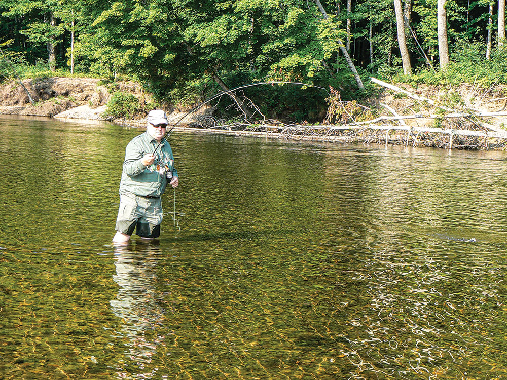 The late Jack Hanley, fly fishing the Saco River in New Hampshire