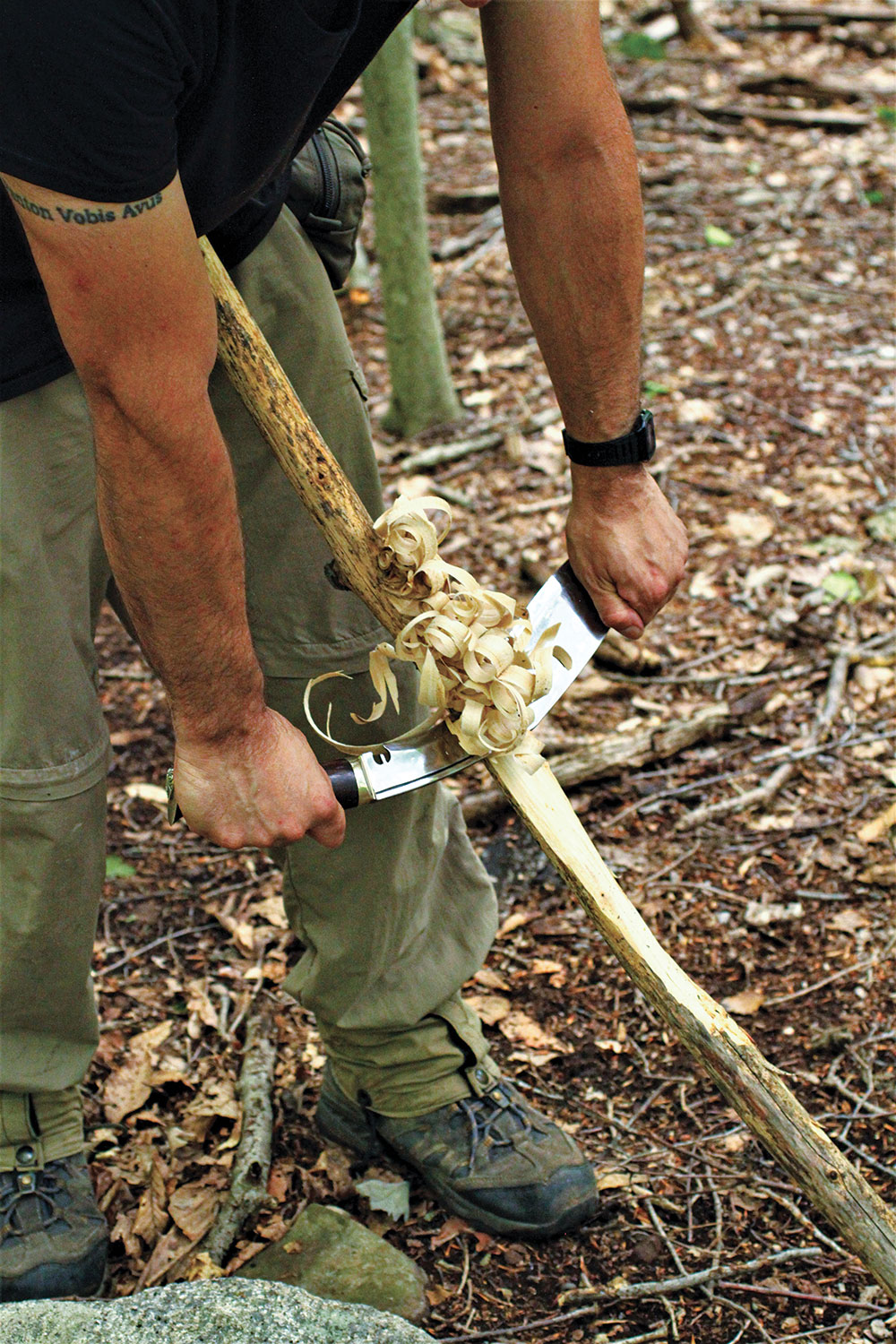 The author makes kindling with the Knives By Hand 12-inch Survival Kukri