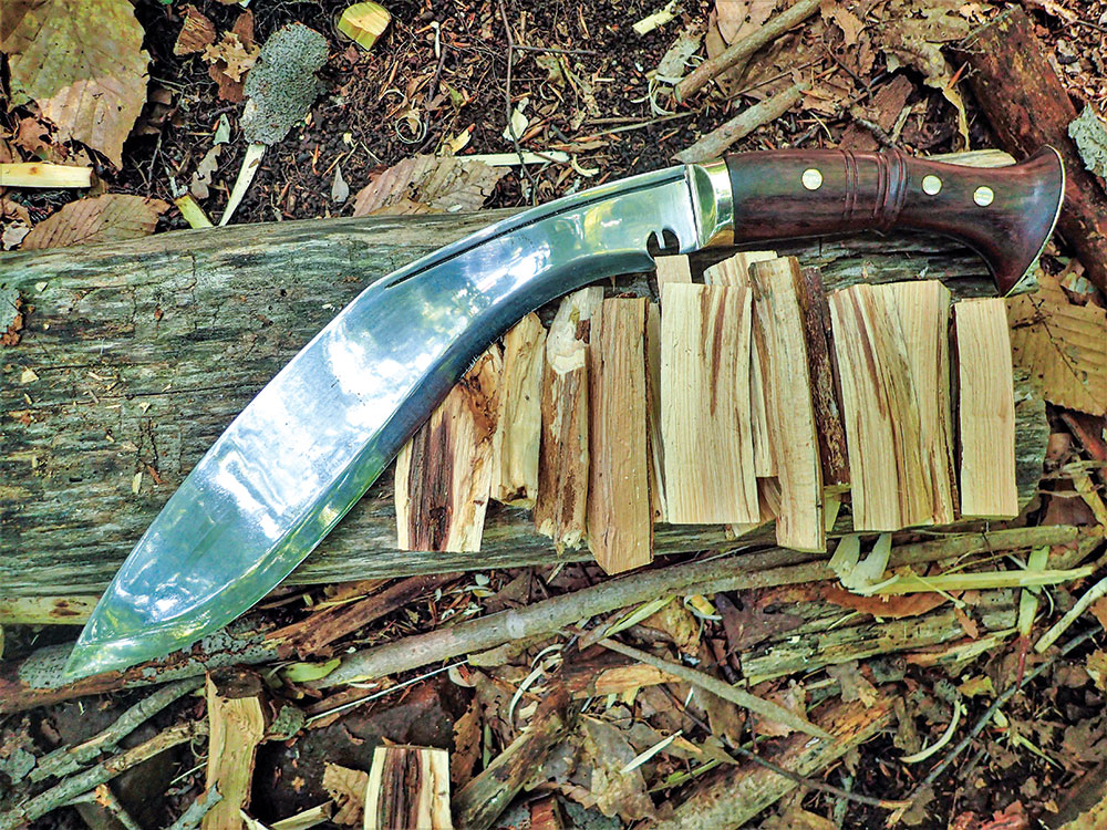 Keeping an Uberleben Stoker stove well fed, the Knives By Hand 12-inch Survival Kukri split hardwood with short, controlled chops and a baton.