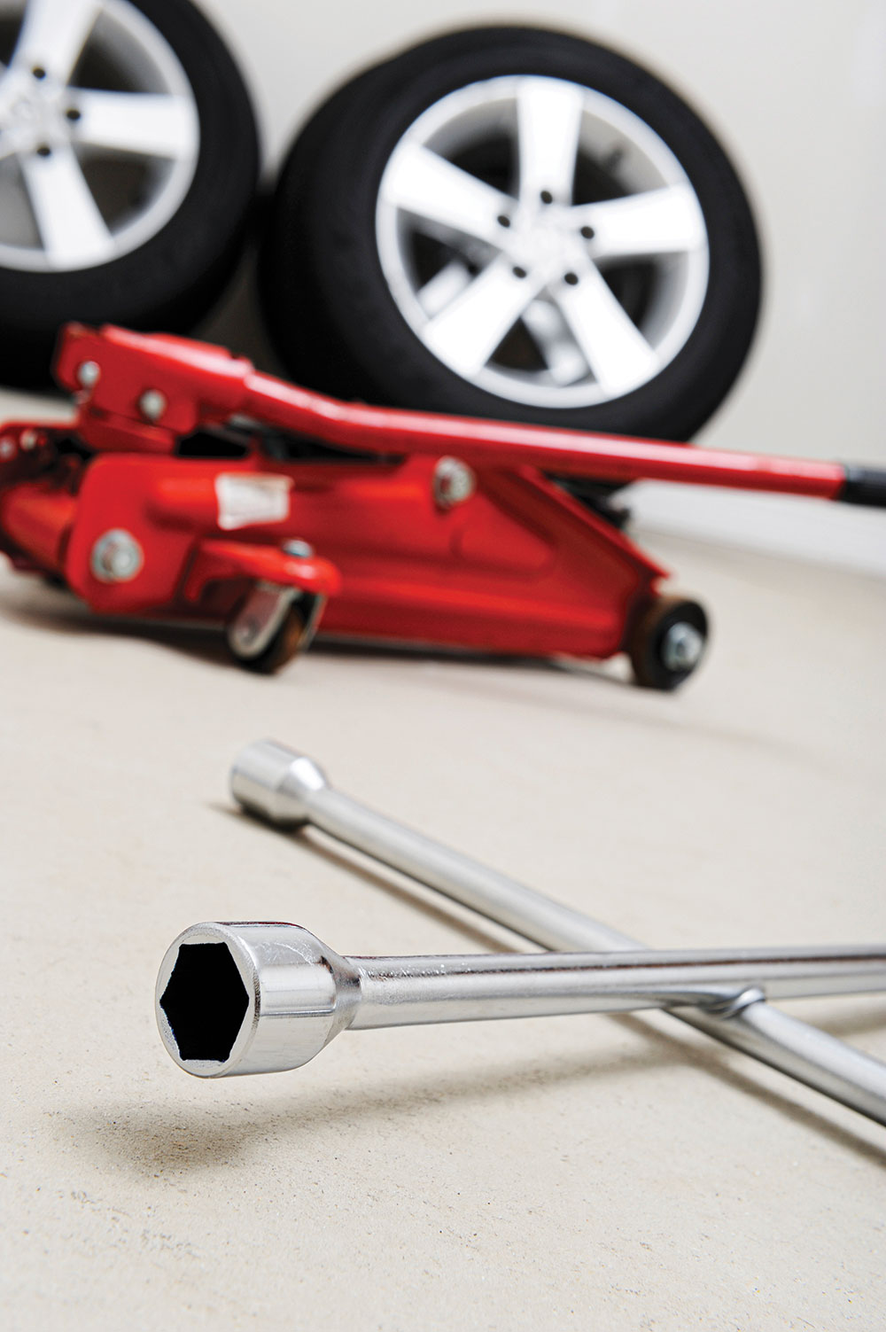 Consider keeping an aftermarket jack and lug wrench in your vehicle