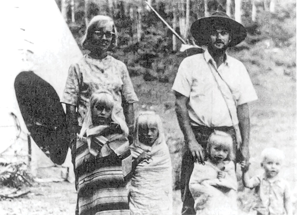 Olsen (with hat), wife Sherrel and children at one of their early survival trips, circa late 1960s