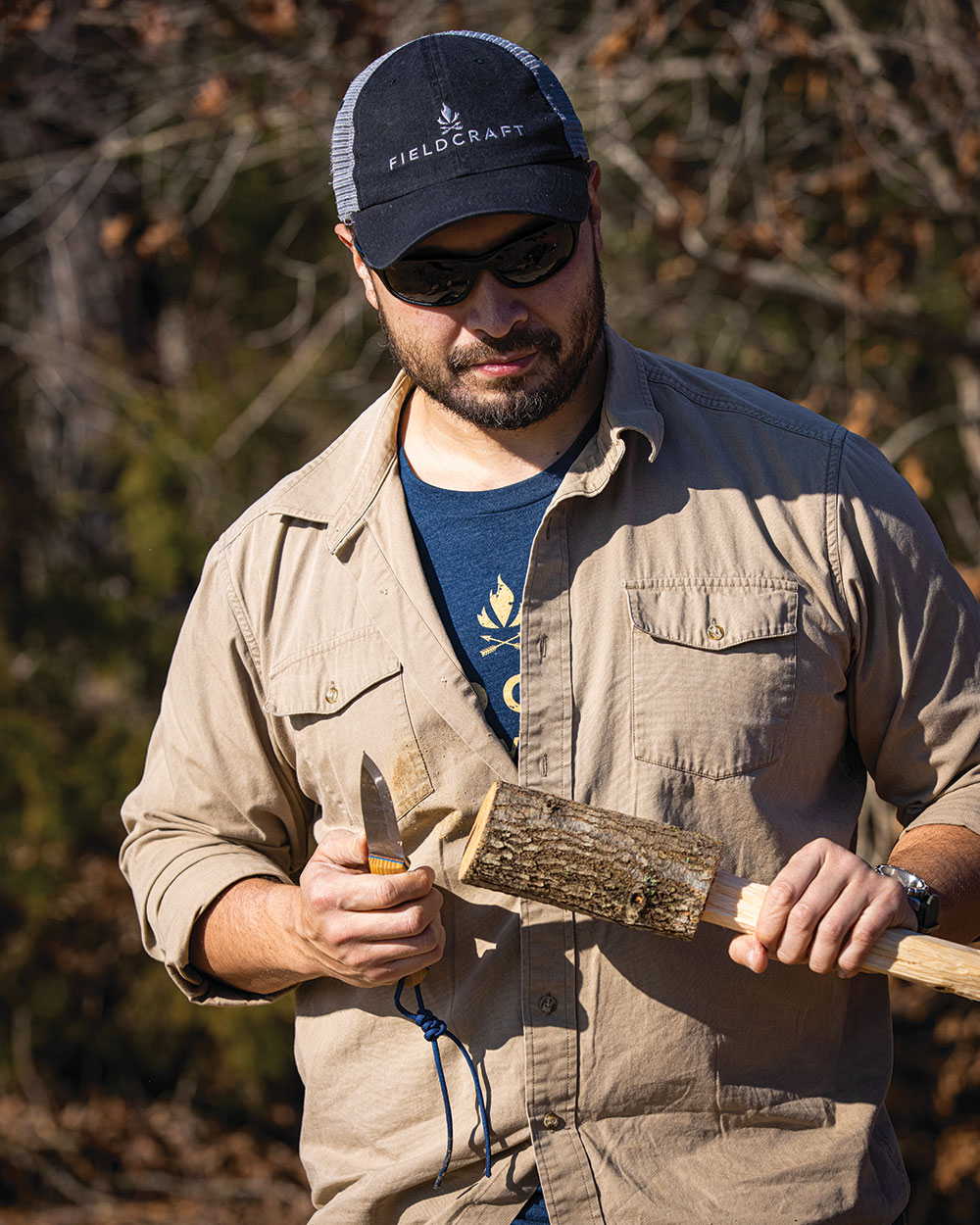 Kevin Estela holds a maul 