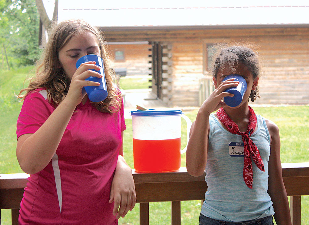girls are testing some sumac lemonade 