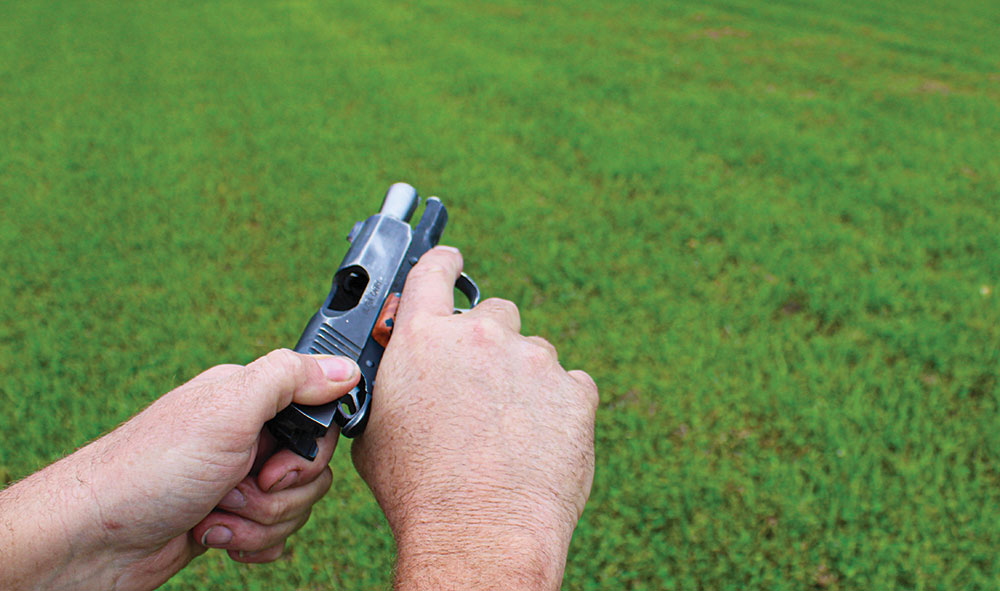 After seating the magazine with a firm “bump,” pull back the slide and release it to get back into the fight.