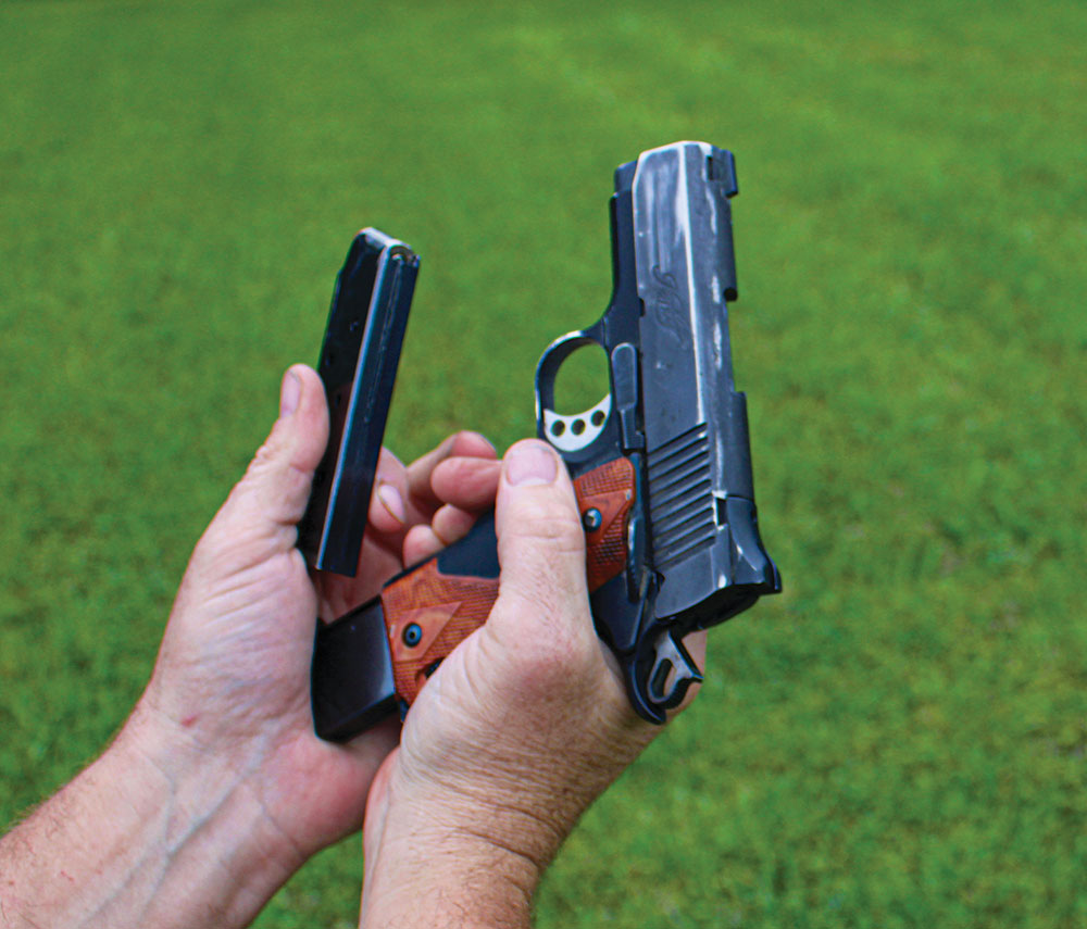 In a tactical reload, you need to catch the magazine from the gun by slipping the full magazine between the middle and ring fingers.