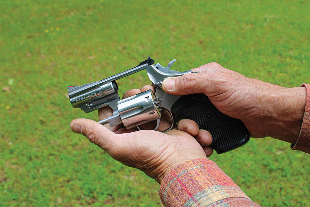 Open the cylinder with the middle two fingers of the support hand for better stability during the reload.