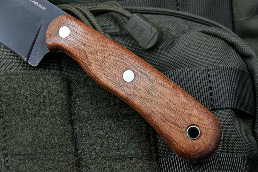 The Seeker features a Sapele hardwood handle that’s thick and well contoured to fit the hand well.