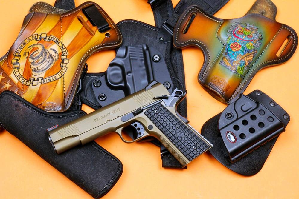 The author has several holsters for this 1911, including an Alien Gear chest holster and a couple from Savoy Leather.