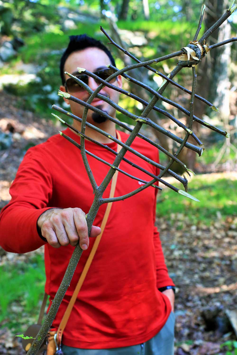 The author made a grill with a knife out of green wood. 