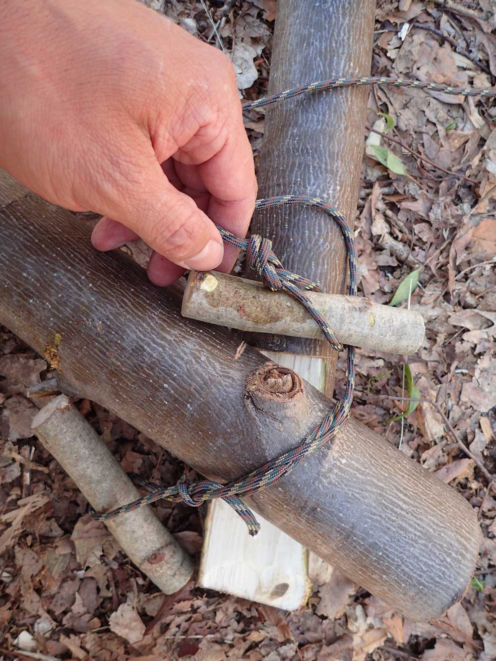 A constrictor knot can be used with two wooden toggles to cinch it extra tight.